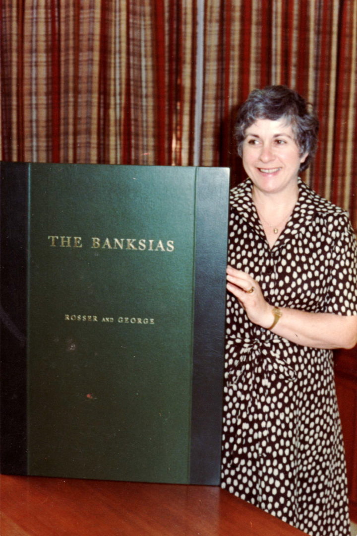 Celia Rosser, pictured with the first volume of the Banksias