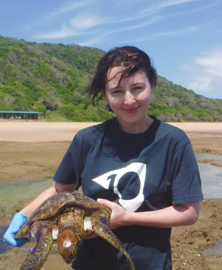 Dr Roksana Majewska holding sea turtle Kosi Bay SA