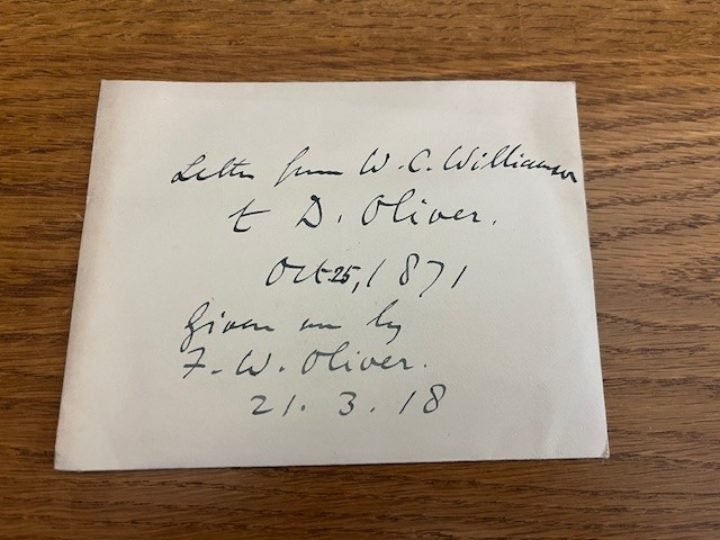 Image of a white envelope with inscription "“Letter from W.C. Williamson to D. Oliver. Oct 25 1871 given me by F.W. Oliver. 21.3.18”"