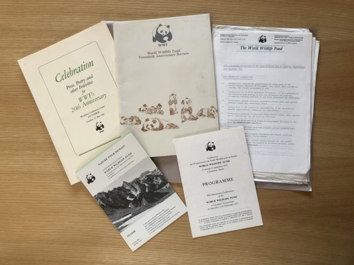 a selection of papers from the 20th Anniversary of WWF including booklets, invitations and a letter most with WWF panda branding
