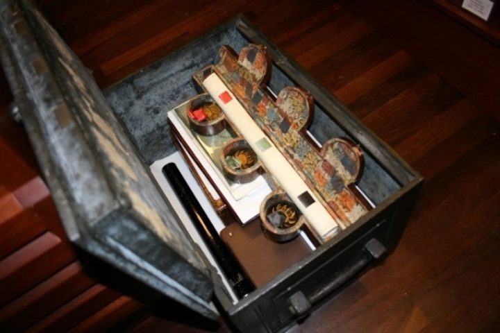 Photograph of the inside of the Iron Chest filled with papers and boxes