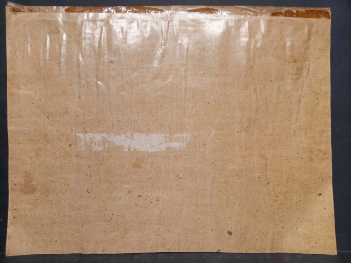 Recto side of backing paper.